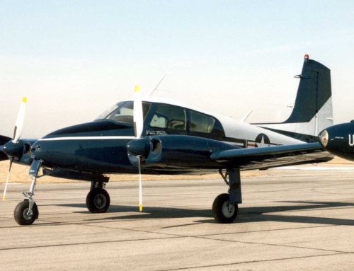 A small airplane sitting on top of an airport runway.